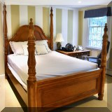 F35. Carved four-post queen bed. 90”h 